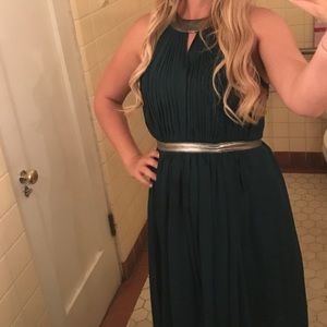 Floor length dark green princess dress